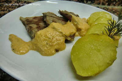 Presa Iberica Con Salsa De Tomates Secos Y  Romero