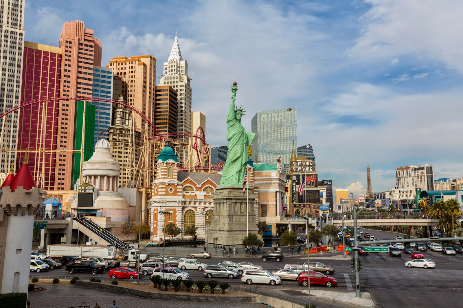 here is a photo of new york new york shot on a pedestrian overpass in the center is las vegass famous mini statue of liberty