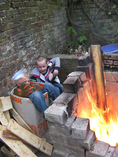 broken pallet on brick built bonfire