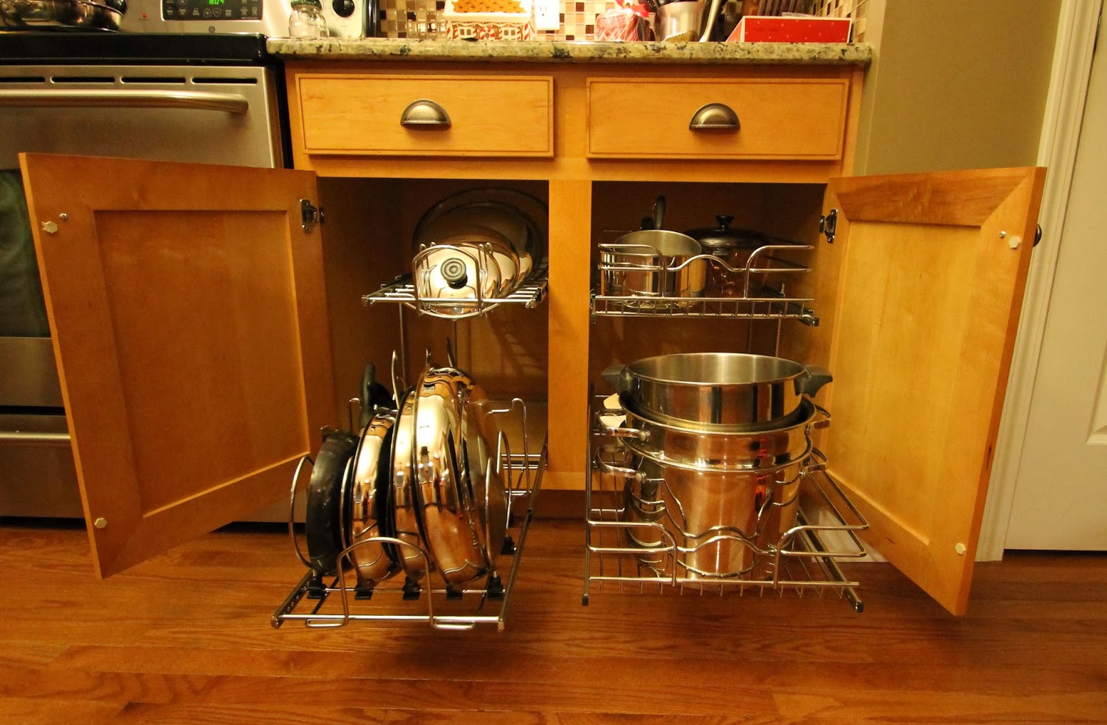 Kitchen cabinet pull out shelves RevAShelf Two Tier Cookware Organizer