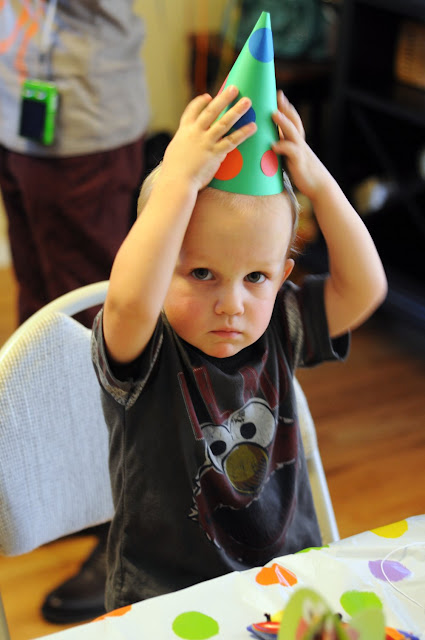 toddler in party hat