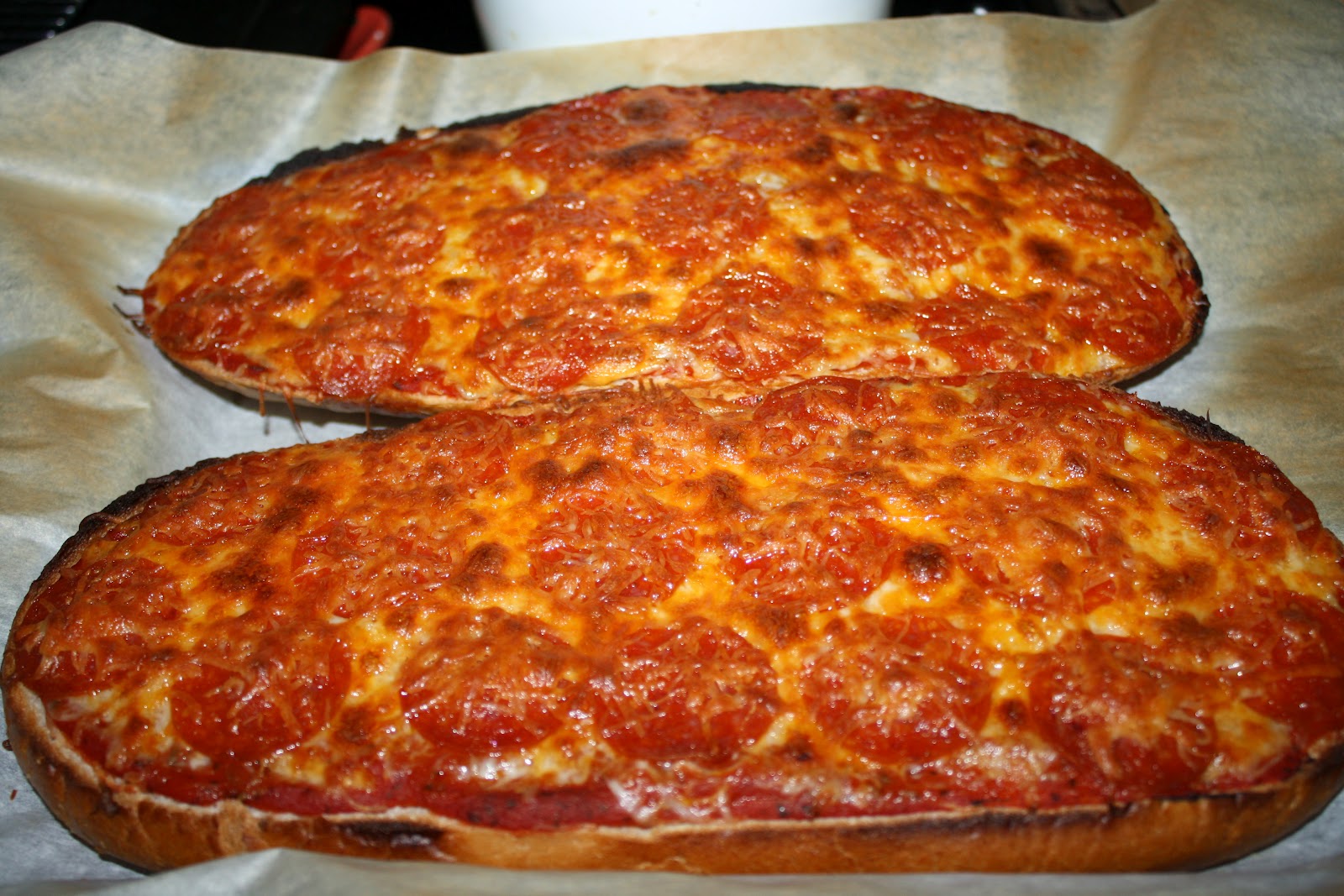 The Roman Household Pizza Logs