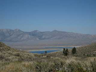 View of Crowley Lake and distant mountains from McGee Creek Road in the Eastern Sierras.