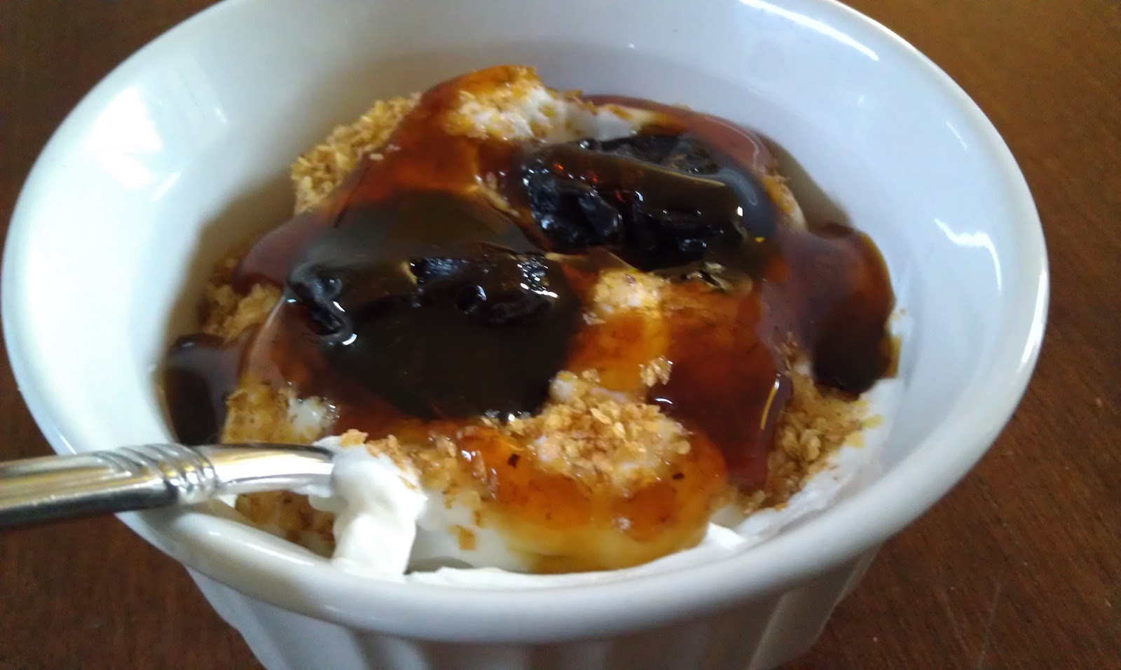 Fresh From My Kitchen Yogurt Topped With Honey, Prunes and Wheat Germ