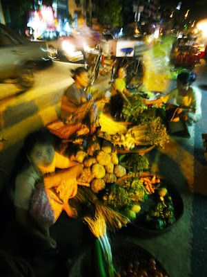 fruits for sale on the road side around Theingyi Zay