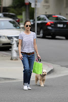 Minka Kelly takes a stroll with her dog Chewy  