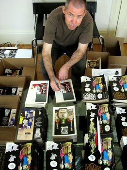 Dave Sim surrounded by his work Dave Sim surrounded by his work