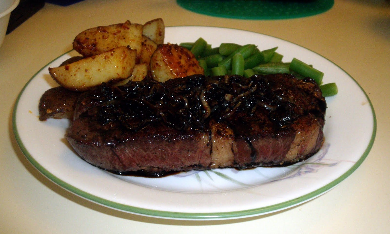 Pooka's What's for Dinner Rib Steak with Balsamic Glaze and Onion Relish