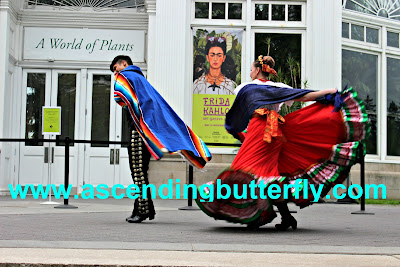 Calpulli Danza Mexicana performing outdoors at Frida Kahlo Art Garden Life Exhibition at The New York Botanical Garden