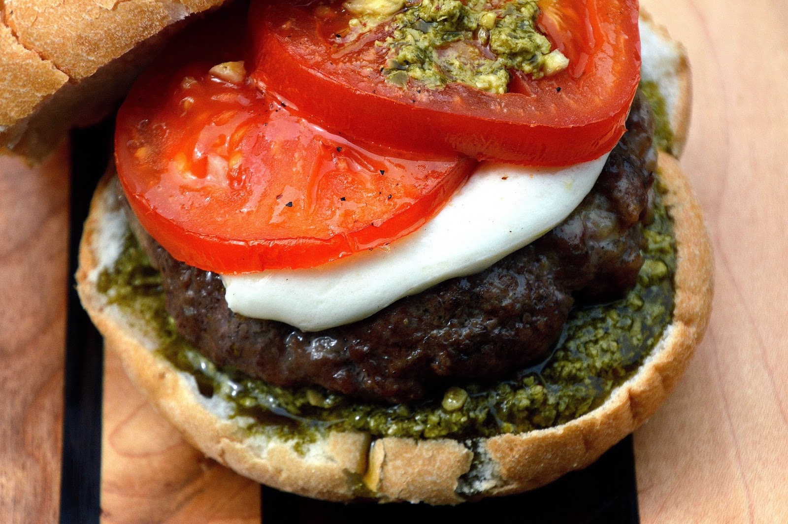 Souffle Bombay Sausage & Beef Burgers with Roasted Tomatoes Mozzarella