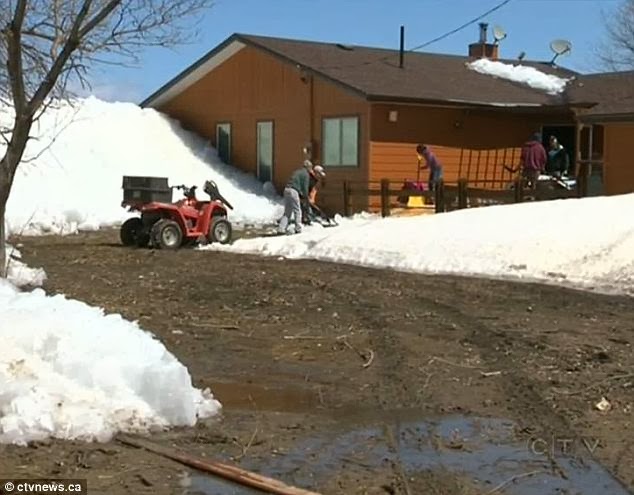 Homeless: Canadian officials were at work Saturday helping the community dig out of the ice and to find shelter for those left homeless by the floe Homeless: Canadian officials were at work Saturday helping the community dig out of the ice and to find shelter for those left homeless by the floe