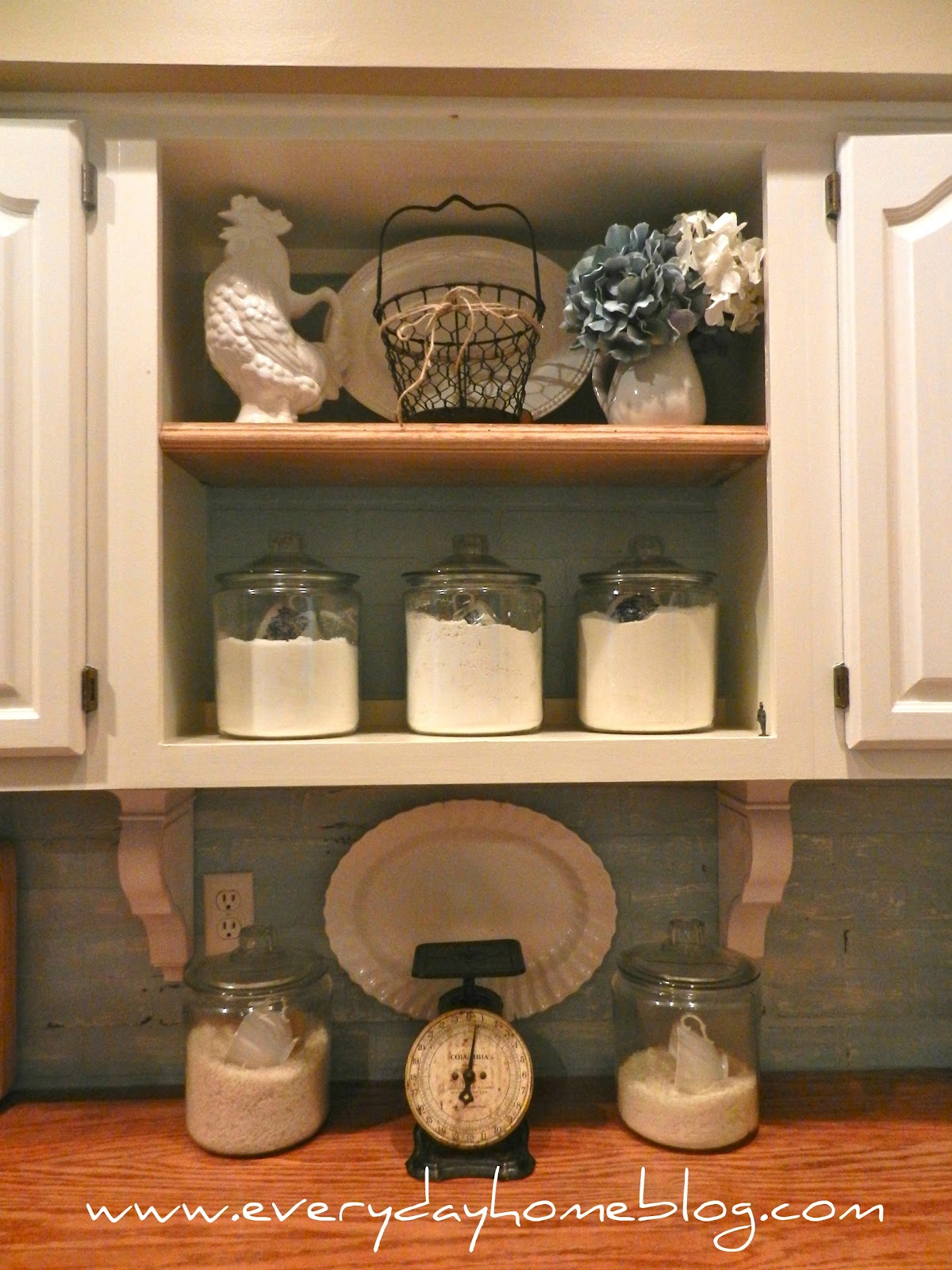 Budget Friendly Painted Brick Backsplash At The Everyday Home White Kitchen Cabinets Corbels Faux Backsplash Brick Paint