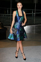 Miranda Kerr glamorous in a colorful dress