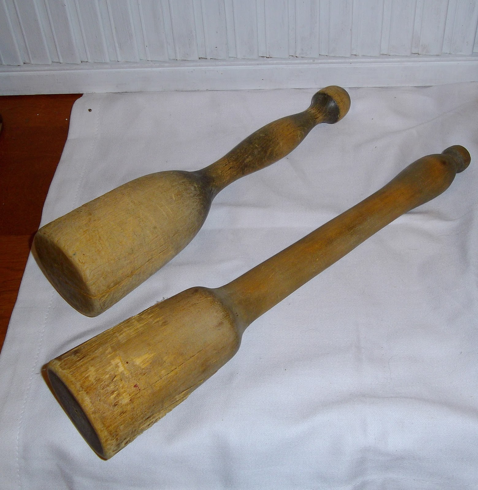 a Vintage Green Treen Vintage Turned Wooden Potato Mashers