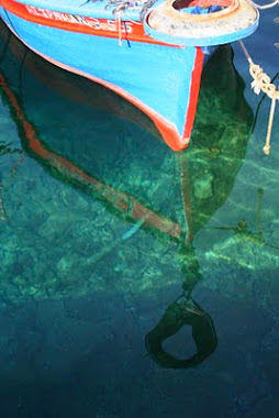 Meganissi boat reflection, 2010