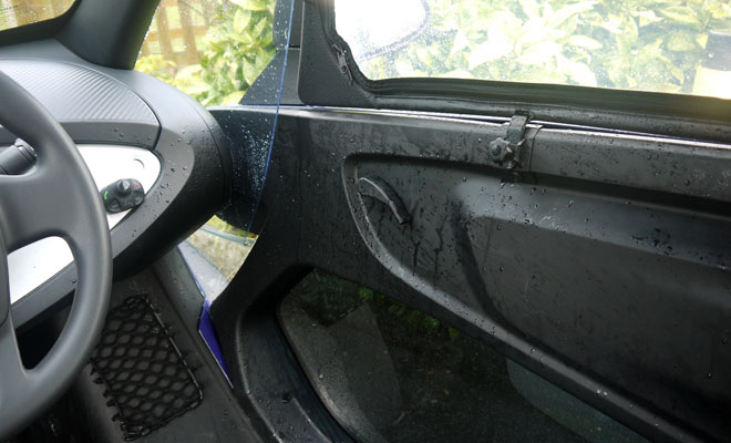 Water gets past Twizy sidescreens but doesn't drip onto your lap