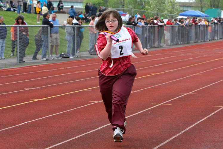 COLCHESTER SPECIAL OLYMPIAN IN RELAY EVENT.