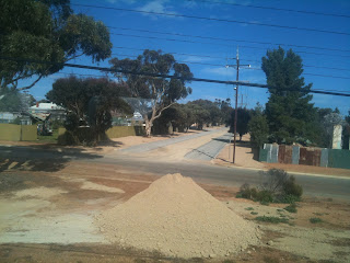 a pile of dirt on a road