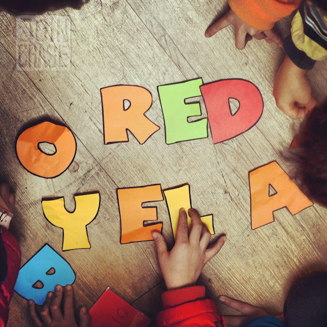 Kids spelling colors after playing Steal the Bacon in Ochang, South Korea.