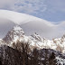 An unusual cloud formation crosses the summit of the Grand Teton