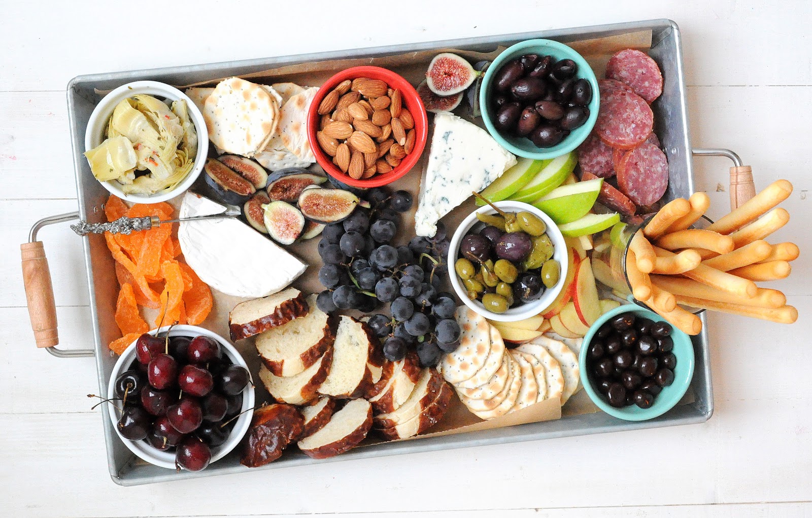 putting together a beautiful cheese board