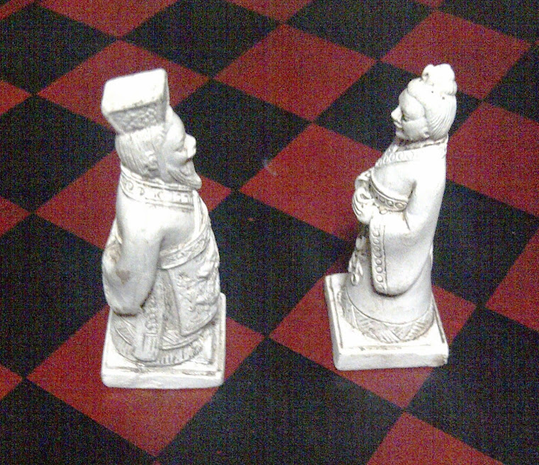 Figural Pieces Facing Each Other