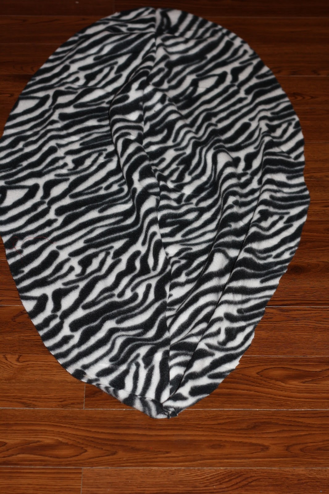 Then, take another wedge and sew it to the second wedge. One thing I should add is not to sew