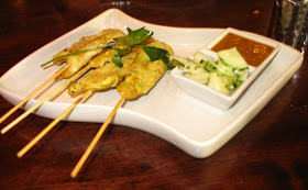 Chicken satay with cucumber and satay sauce