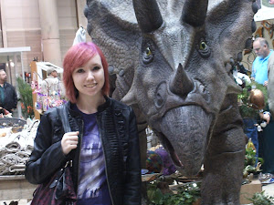 Yes that is me standing next to a dinosaur.