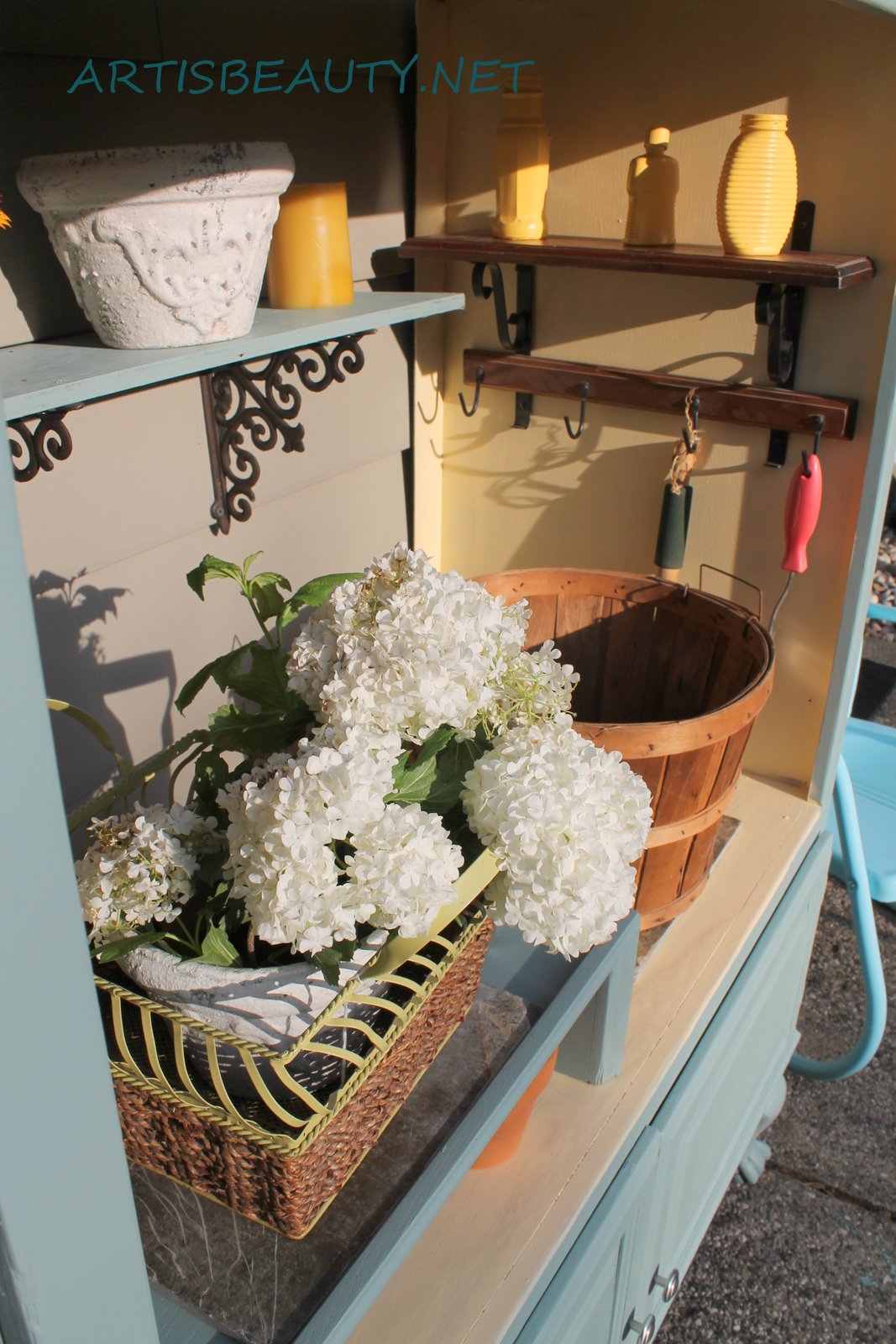 ART IS BEAUTY FREE armoire turned into outdoor Garden Potting Center
