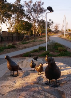 Bronze California Quail statues near the Mary Avenue bicycle / pedestrian bridge