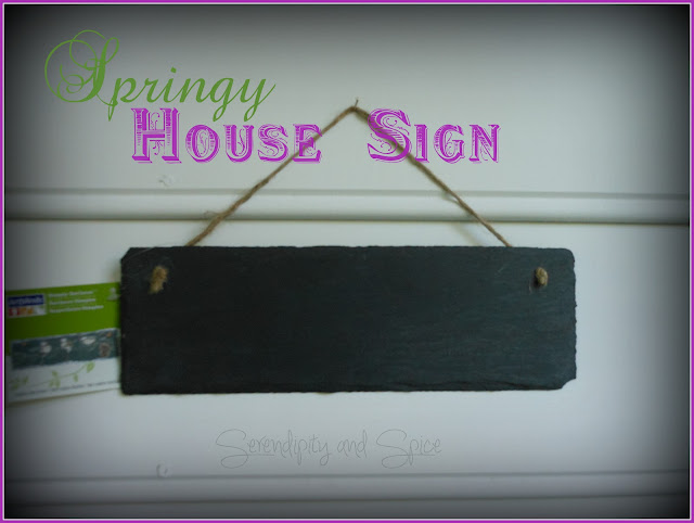 blog+080 Spring House Number Sign Finally, after the 5th package was delivered my husband suggested making a sign for the door.  Well, I wasn't just going to write the house number on a sheet of paper and tape it to the door like he suggested.... men! :)  I went to Michael's and found this cute slate sign for just $2.99!
