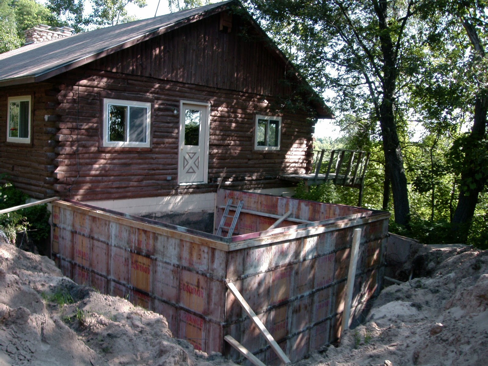 The Cabin Countess Putting a New Addition on a Log House