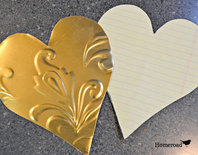 Make your own tin heart ornaments. Gorgeous and easy! via Homeroad, featured on http://www.ilovethatjunk.com 