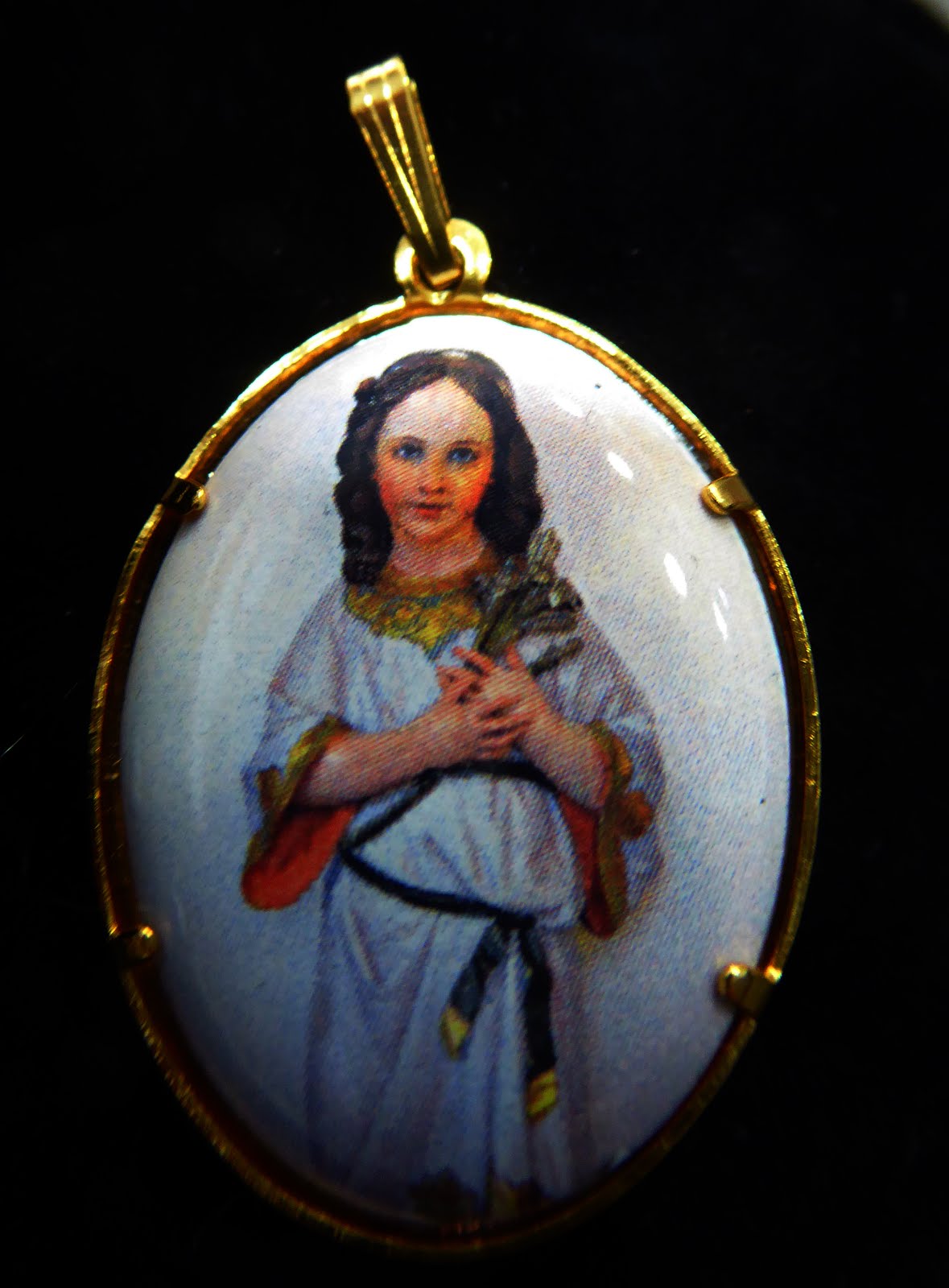 Medalla de la Virgen Niña