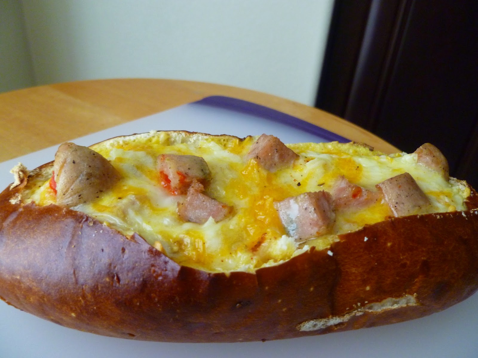 The Pastry Chef's Baking Sausage, Egg, and Cheese Pretzel Bread Boat