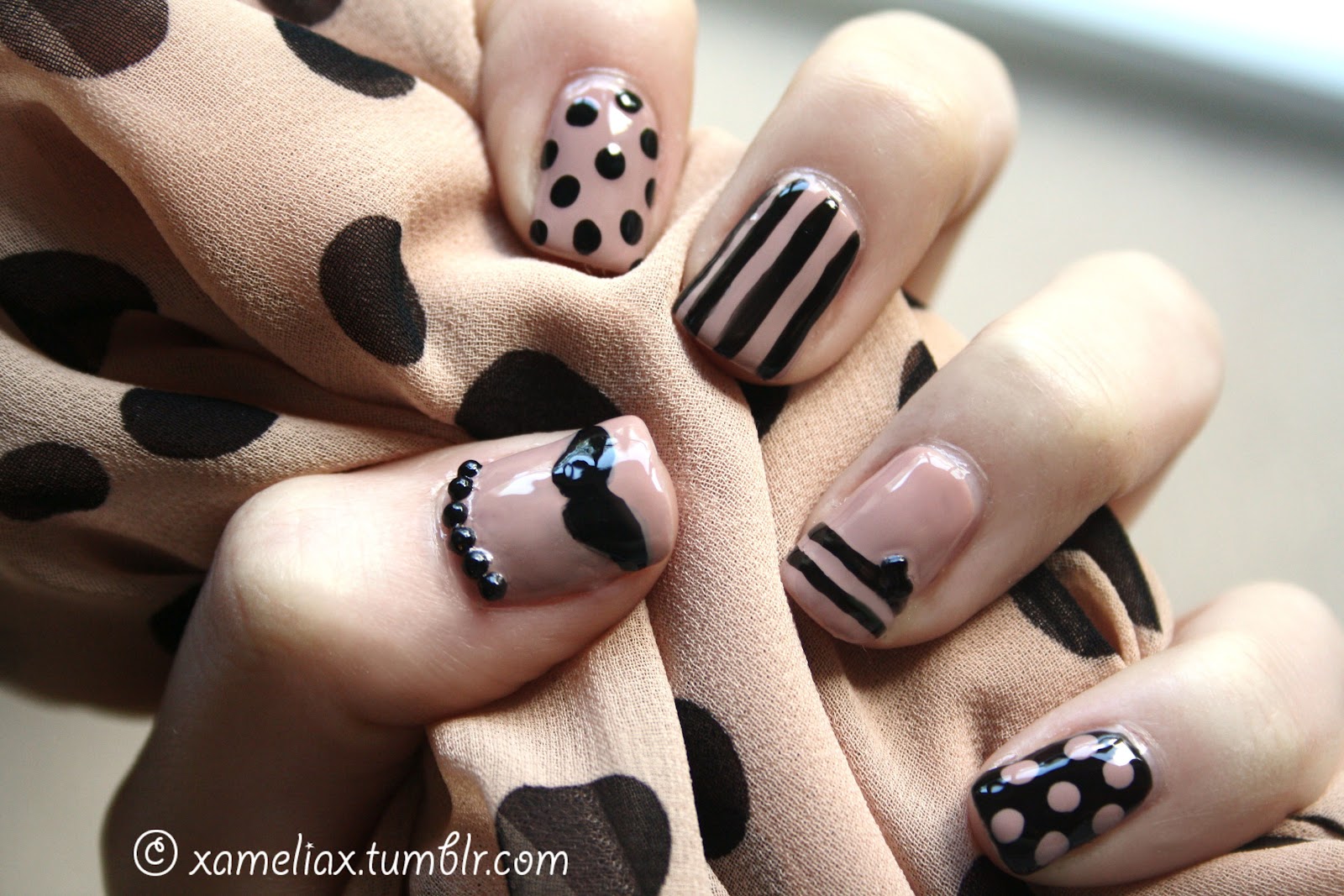 7. Nude and Black Polka Dot Nails - wide 7
