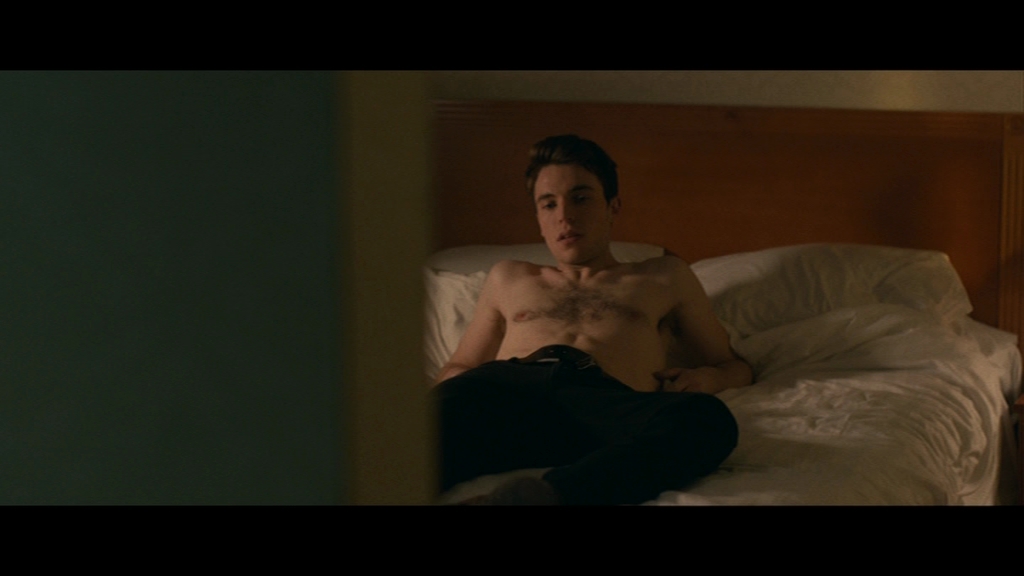 Tom Hughes - Shirtless, Barefoot & Naked in "I Am Soldier" .