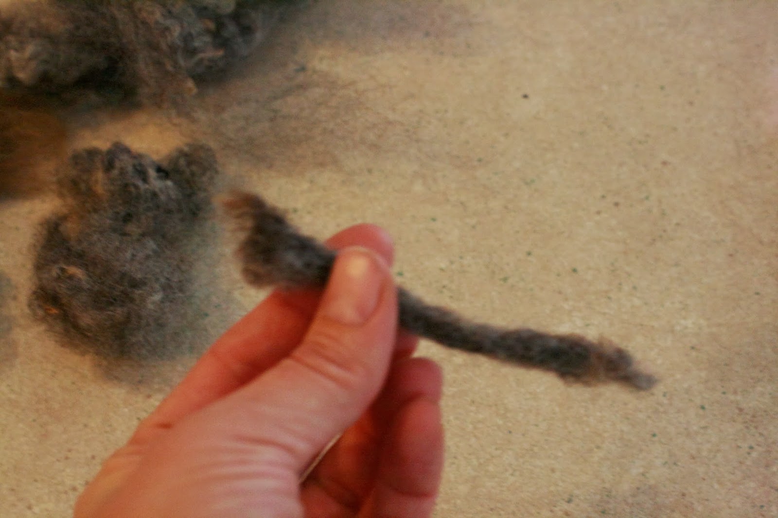 a needle felted mousy friend. June Cleaver in yoga pants