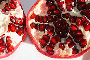Autumn Treats. Delicious Organic Pomegranate (pomegranate fruit halves)