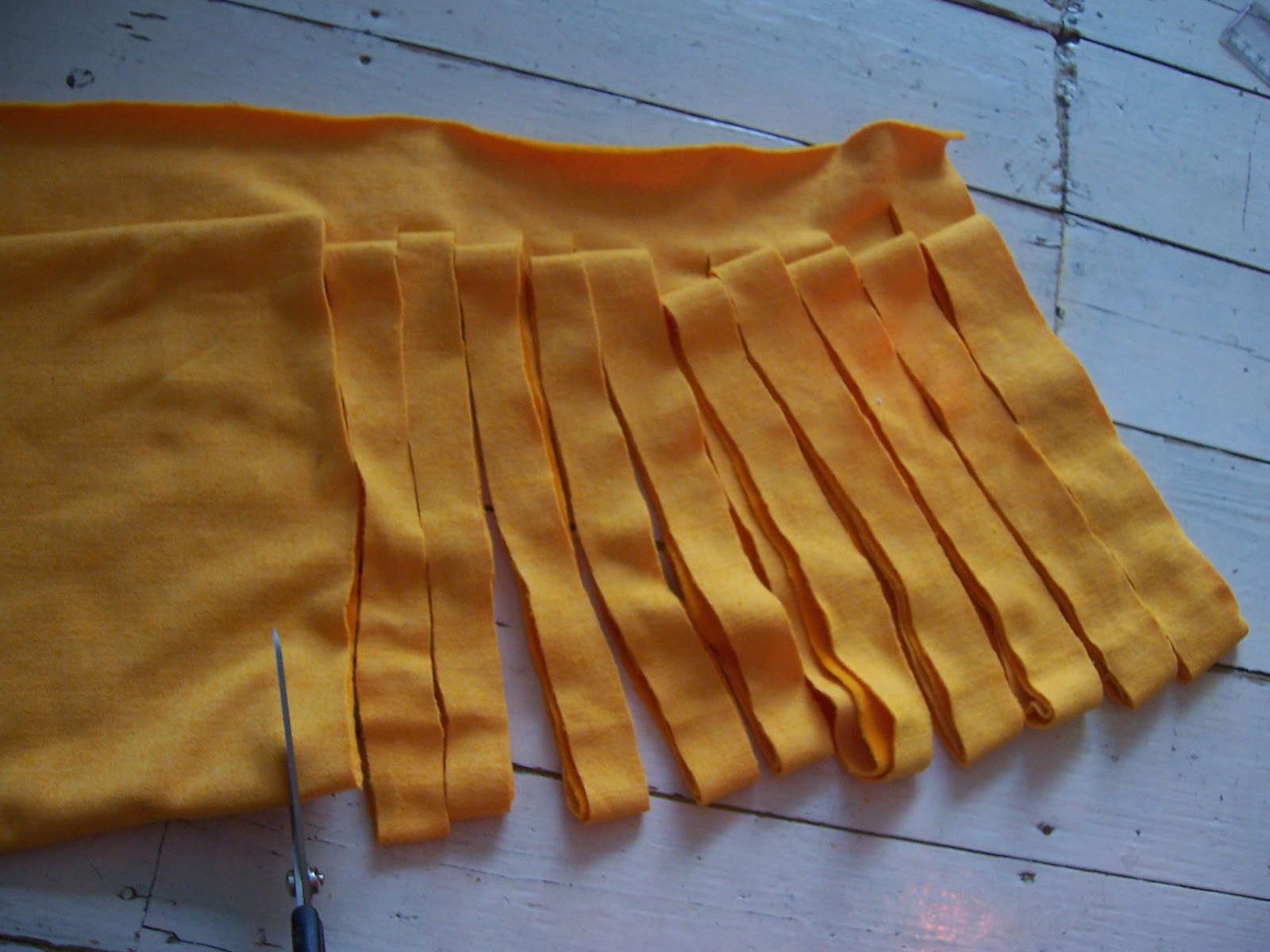 Little Bird SOS Making a rag rug for the new year!