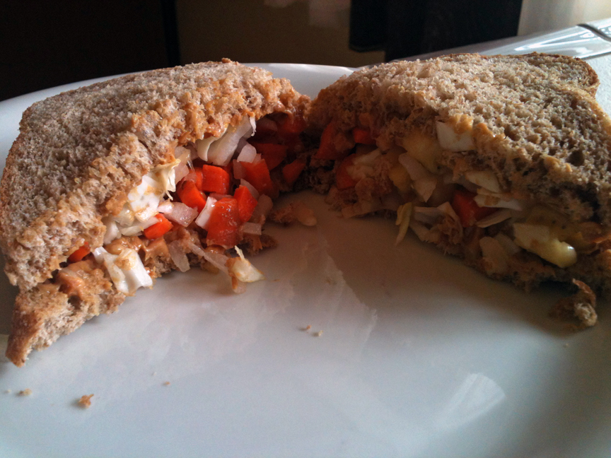 Peanut Butter Sandwich with chopped cabbage, onions, carrots, & bananas