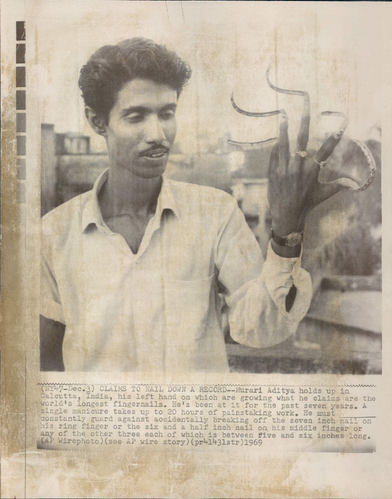 the Guinness World Record Book, Aditya's nails were 108.5 inches long