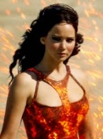 Jennifer Lawrence stars in The Hunger Games: Catching Fire, written by Simon Beaufoy and Michael Arndt