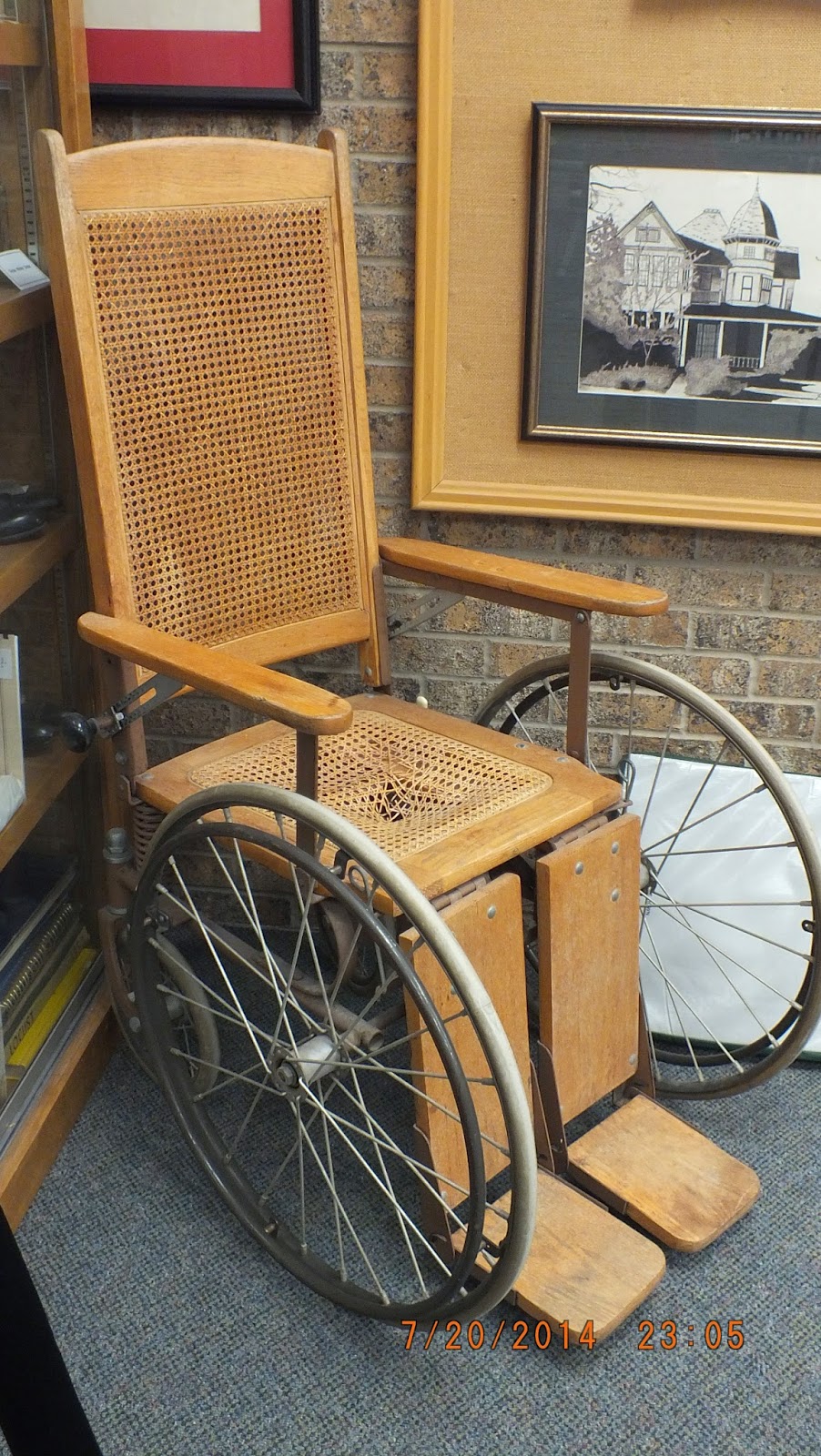 Red River County Public Library Antique wheelchair has a new home here the library!