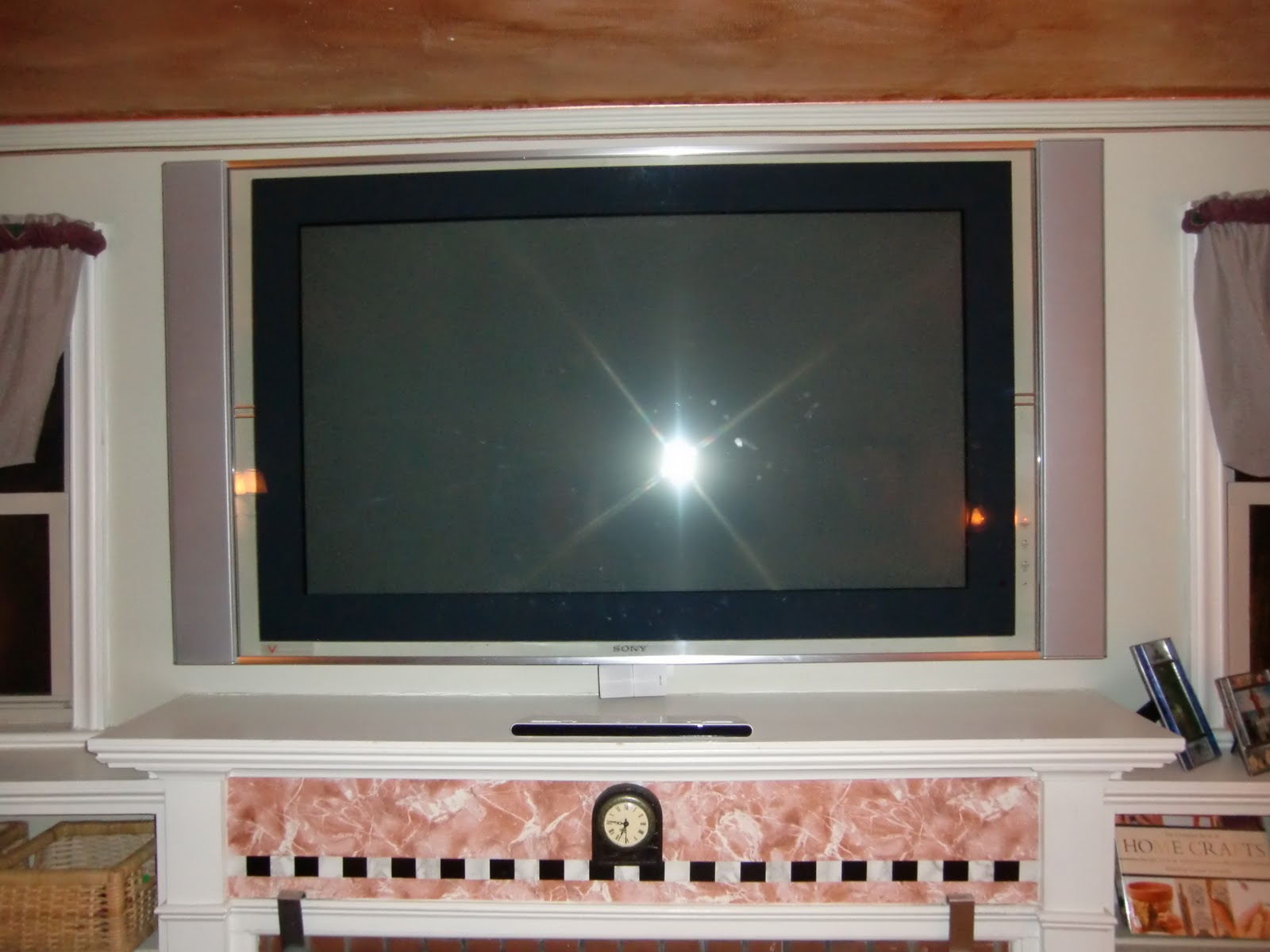Best Organizing Tips: How To Hide Your Big Screen TV Without Your