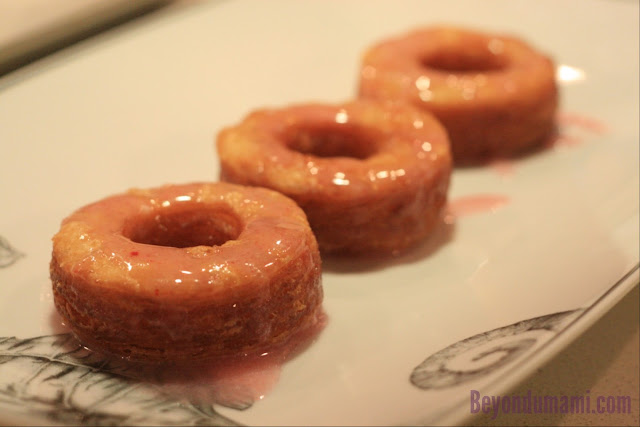 Three Dinner With Julie Cronuts drizzled in strawberry glaze.