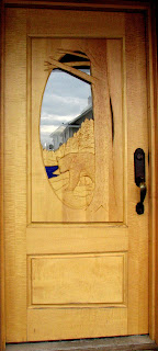 Awsome, custom, carved, entry door, https://huismanconcepts.com/custom-carved-doors/