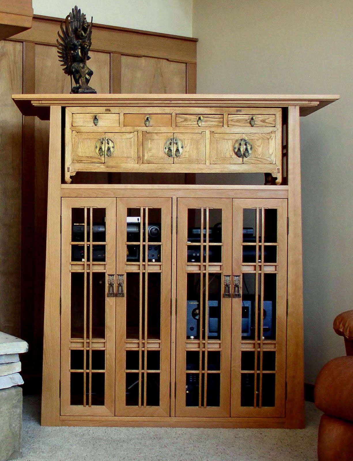 A Media Cabinet with an Oriental Chest
