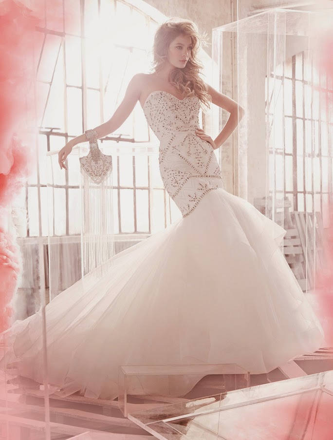 HARLEY PAIGE WEDDING DRESSES SPRING 2015 BY JLM COUTURE hand cut faux leather fit to flare “bridal gown”, studded elongated bodice with sweetheart neckline and tiered tulle skirt with horsehair trim. wedding dresses